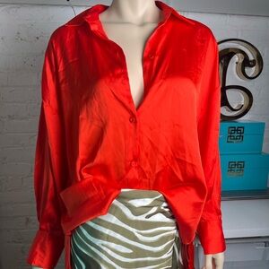 Red silky button up blouse